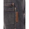 Black denim trouser with leather logo tag