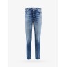 Denim jeans with suede logo patch