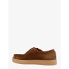 Suede lace-up shoe with embossed logo detail