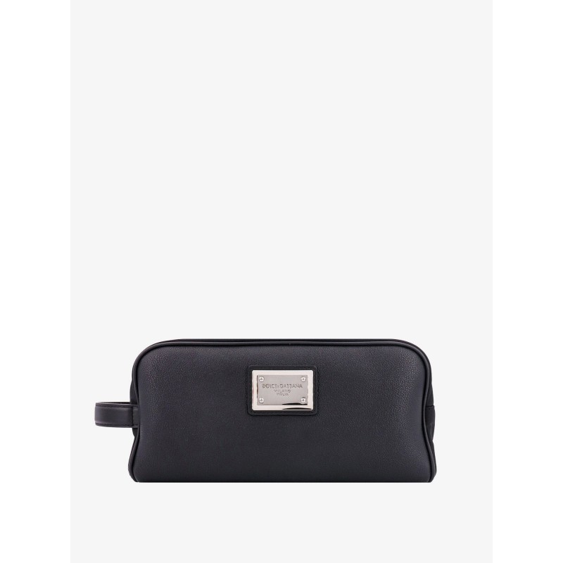 Leather beauty case with metal logo patch