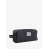 Leather beauty case with metal logo patch