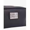 Leather beauty case with metal logo patch