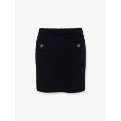 Wool skirt with bouclé effect, mini lenght and pockets with ribbed profiles and gg enamelled buttons