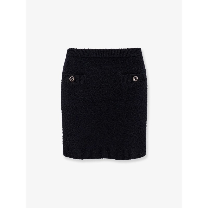 Wool skirt with bouclé effect, mini lenght and pockets with ribbed profiles and gg enamelled buttons