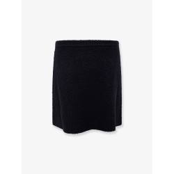 Wool skirt with bouclé effect, mini lenght and pockets with ribbed profiles and gg enamelled buttons