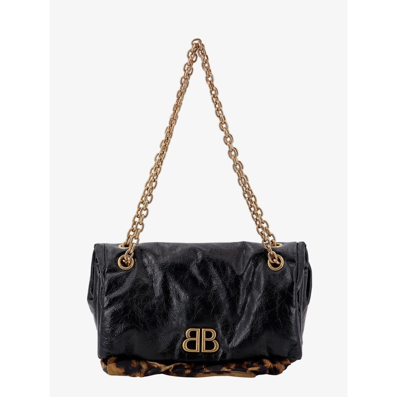 Changeable leather shoulder bag with animalier insert