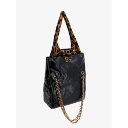 Changeable leather shoulder bag with animalier insert