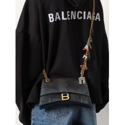 Leather shoulder bag with dirty effect and iconic metal logo