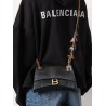 Leather shoulder bag with dirty effect and iconic metal logo