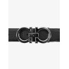 Textured leather belt with iconic gancini buckle