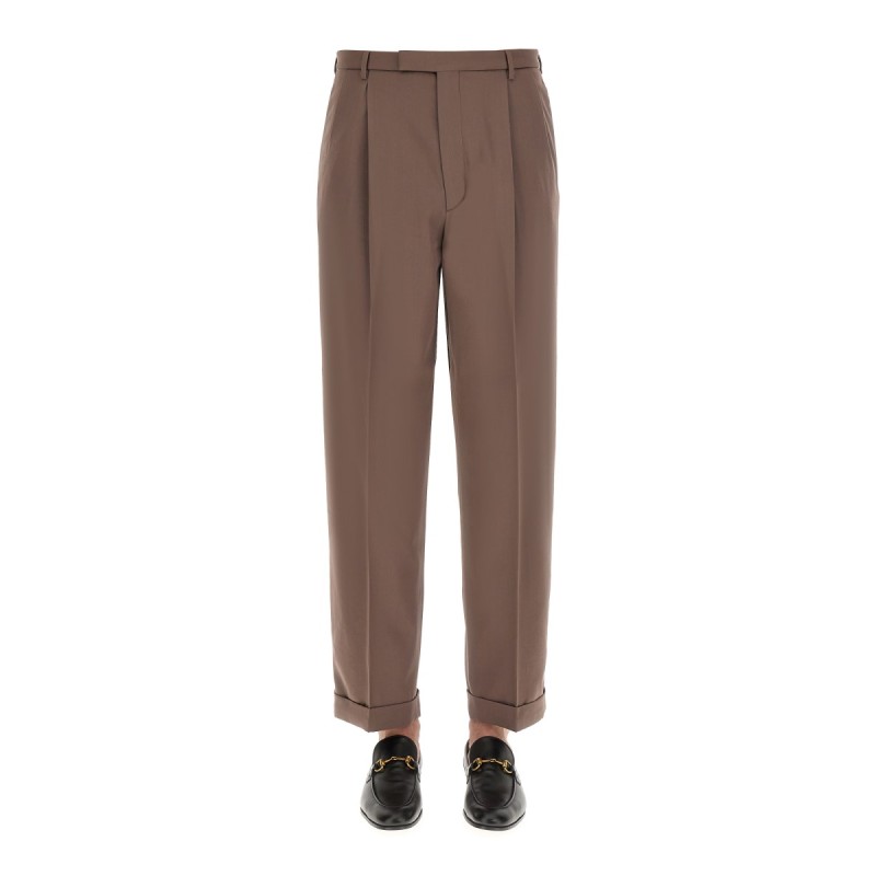 PANTS WITH GUCCI LABEL