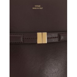 Leather bucket bag with frontal strap