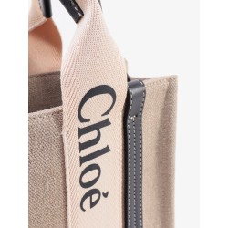 Woody small linen and leather handbag.this bag is made with lower environmental impact material