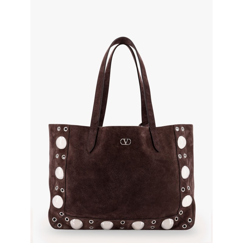 Suede shoulder bag with maxi metal studs