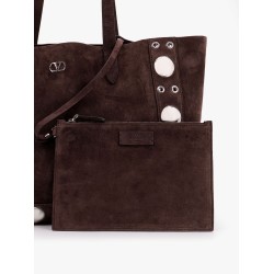 Suede shoulder bag with maxi metal studs