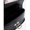 Leather handbag with engraved logo