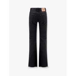 Denim trousers with frayed edges