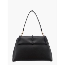 Leather shoulder bag with tassels