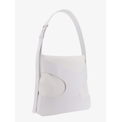 Shoulder bag in leather and canvas with cut-out details