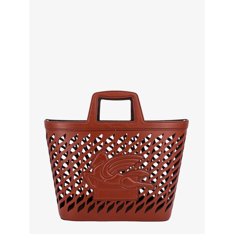 Perforated leather handbag