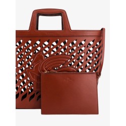 Perforated leather handbag
