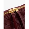 Concert leather clutch with Intrecciato motif