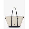 Canvas travel bag with leather profiles