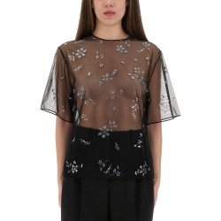 TRANSPARENT TOP WITH APPLICATIONS