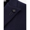 Knitted blazer with iconic brooch