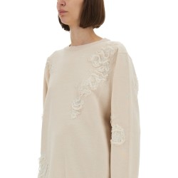 MESH WITH WORN EFFECT DETAILS