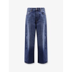 Twisted stone-washed denim jeans