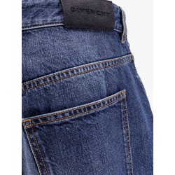 Twisted stone-washed denim jeans