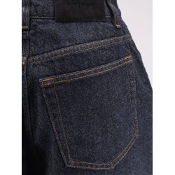 Twisted dark blue denim jeans