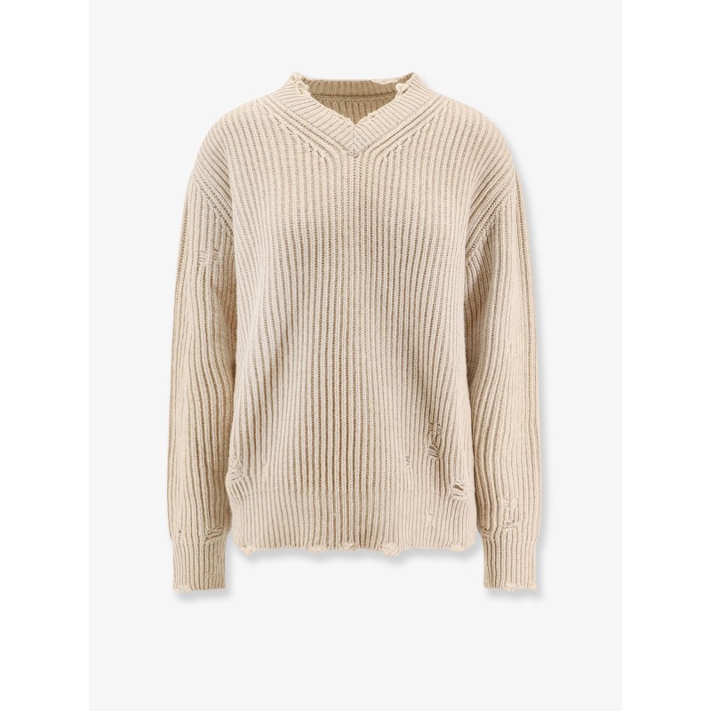 Wool blend sweater with distressed effect