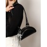 Leather shoulder bag with charms