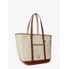 Canvas shoulder bag with leather profiles