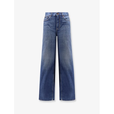 Jeans with leather logo tag
