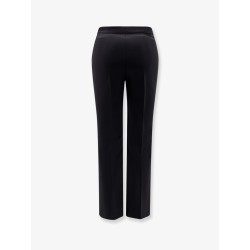 Trousers with logoed button