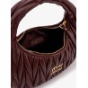 Wander matelassé leather shoulder bag