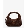 Wander matelassé suede shoulder bag