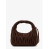 Wander matelassé suede shoulder bag