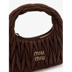 Wander matelassé suede shoulder bag