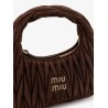 Wander matelassé suede shoulder bag