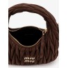 Wander matelassé suede shoulder bag