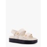 Leather sandals with metal monogram