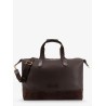 Leather travel bag with suede inserts