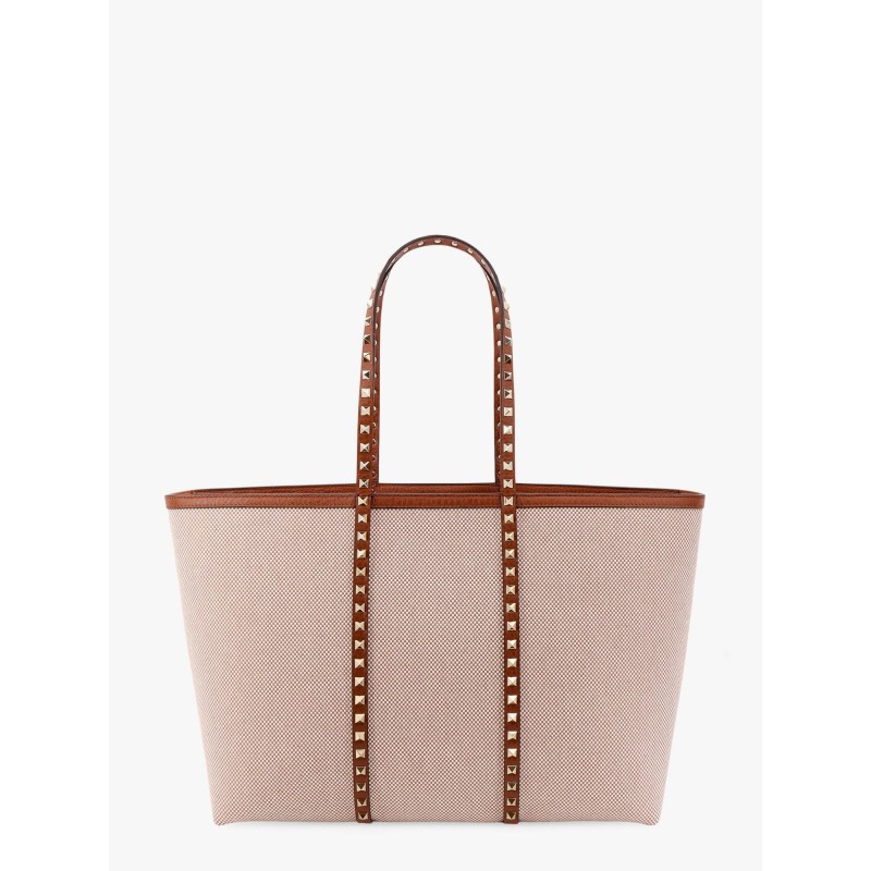 Canvas and leather shoulder bag with iconic studs