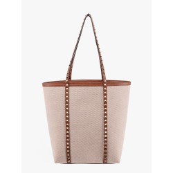 Leather and canvas shoulder bag with iconic studs