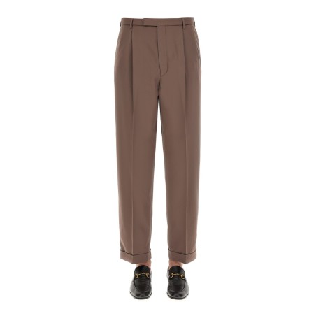 PANTS WITH GUCCI LABEL