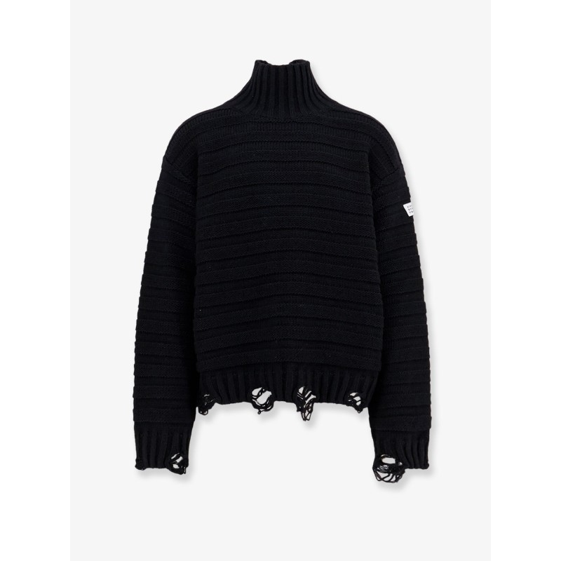 Wool blend sweater with distressed effect
